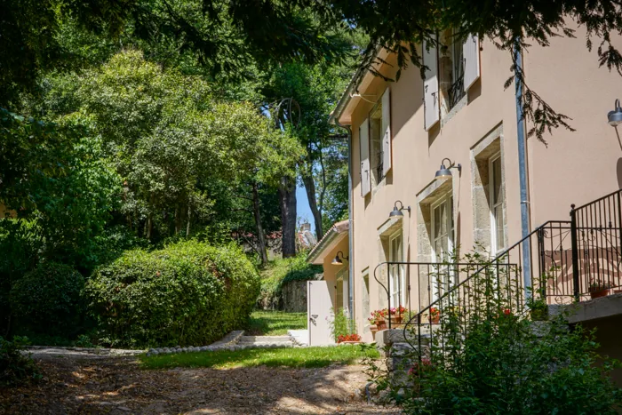 Garden-side façade of Le Clos d'Abrigeon holiday home, Aubenas, Ardèche