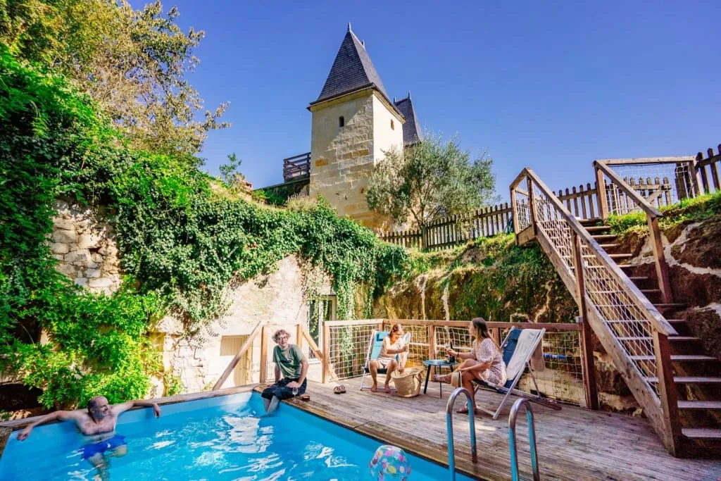 Heated semi-troglodyte pool below the tower of Logis Escale in Cunault