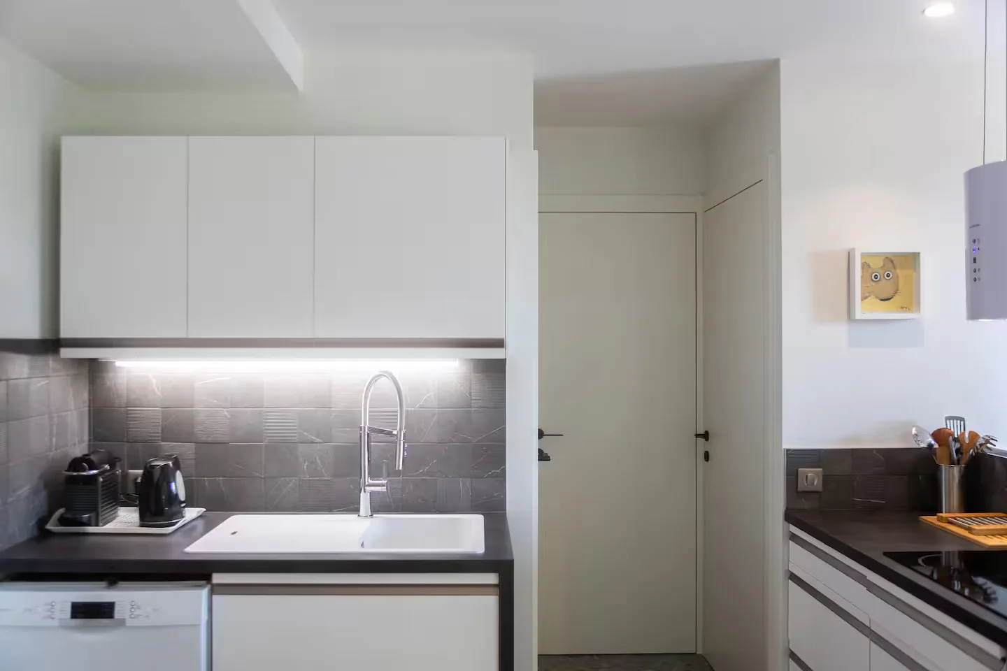 Fitted kitchen with induction hob, dishwasher and Nespresso machine, Maison Chassel