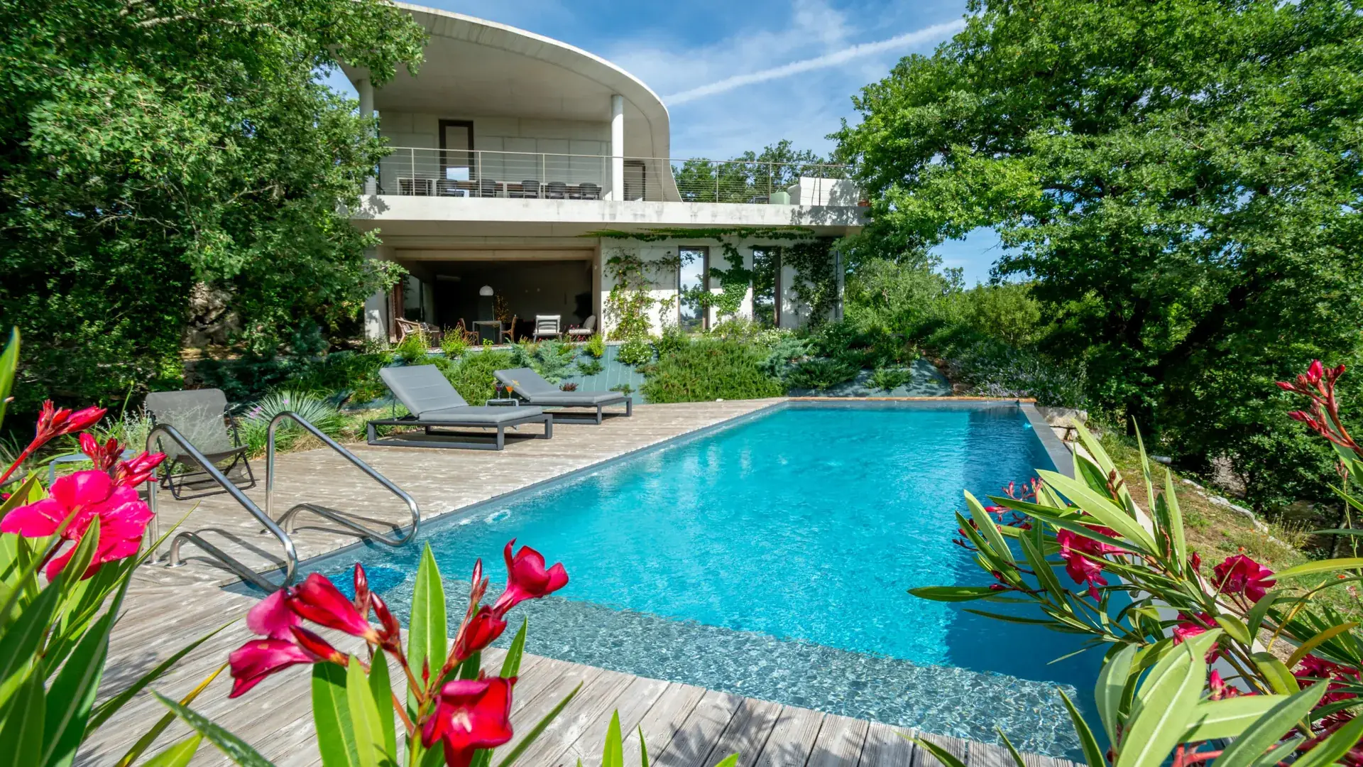 Contemporary house and heated pool framed by oleanders, Maison Chassel in Balazuc